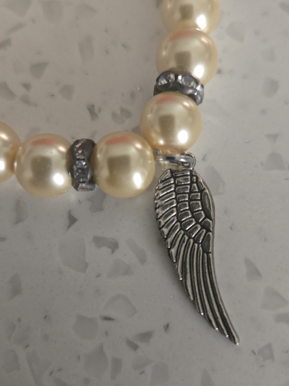 Pearl Bead Stretch Bracelet with Silvertone Wing Charm - Ivory